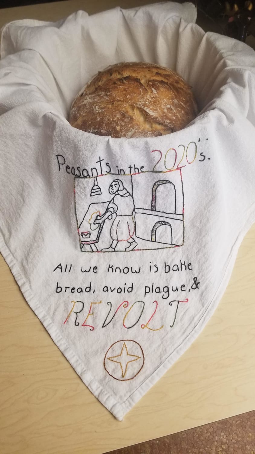 A bread meme stitched on a bread towel to use for baking bread