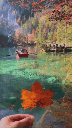 Boating in a beautiful lake in Fall