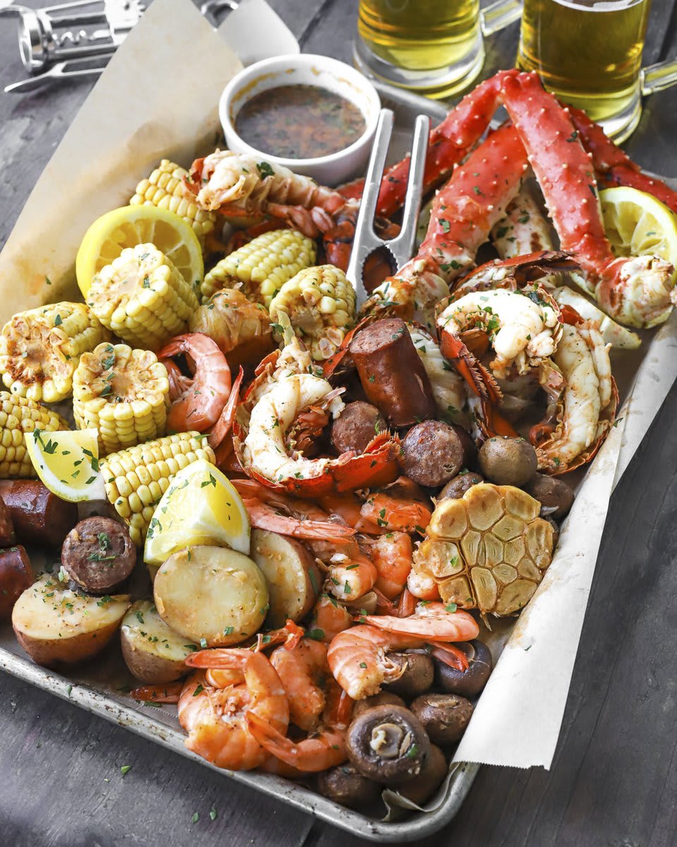 A seafood boil never fails to please. And Maria Do's recipe will help you nail the perfect cook times. The result is a succulent spread of tender seafood, corn, mushrooms, and potatoes that will make you want to crack open a beer and dig in!: