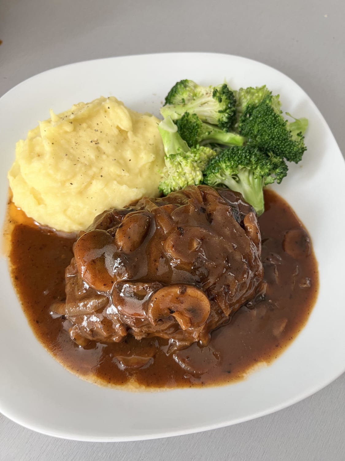 [homemade] Salisbury steak with mushroom gravy, mashed potatoes and steamed broccoli