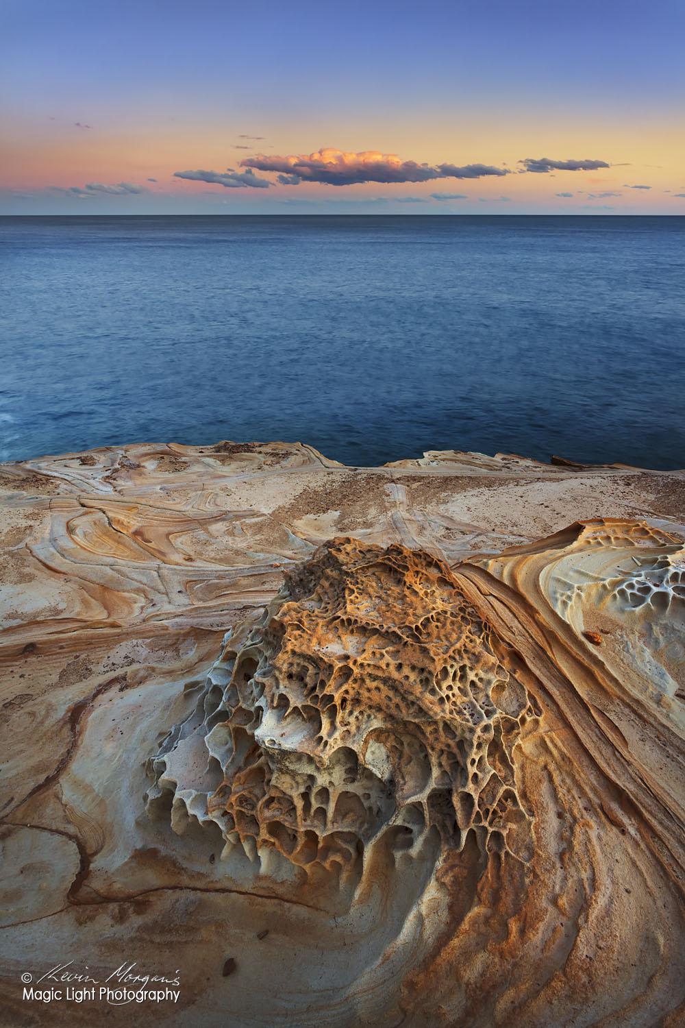 Sunset last night on the rocks at the northern end of Putty Beach in the Bouddi National Park in New South Wales, Australia. I love the colours, shapes and patterns in the sandstone on this headland.