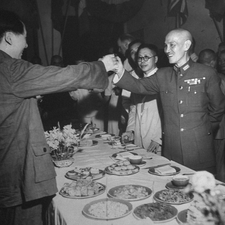 Mao Zedong and Chiang Kai-shek toasting to celebrate the Japanese Surrender - Chongqing, China, September, 1945.