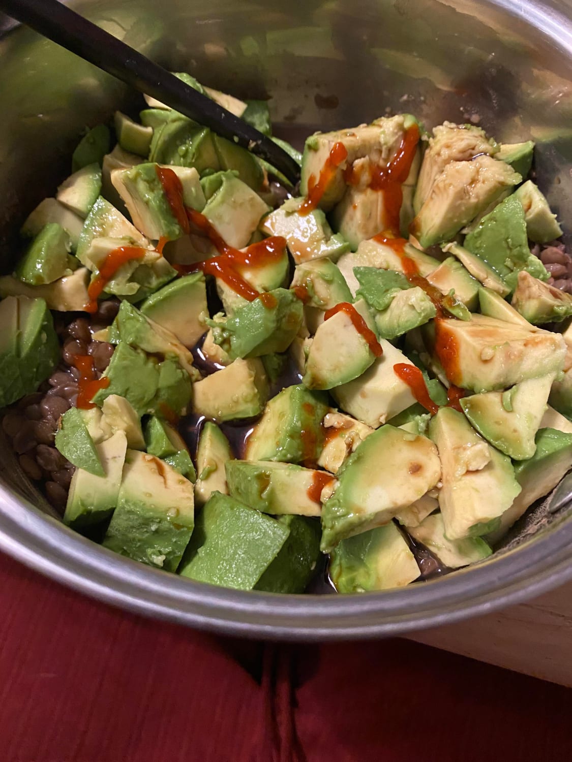 One of my favorite meals and very simple: Lentils (I swear they’re in there), aminos, sriracha, and 2 avocados - about 700 calories and 25g of protein.