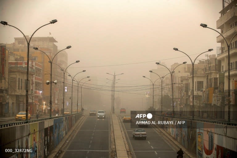 Iraq - Vehicles drive along the underpass under Tahrir Square in the centre of Baghdad during a dust storm. AHMAD AL-RUBAYE