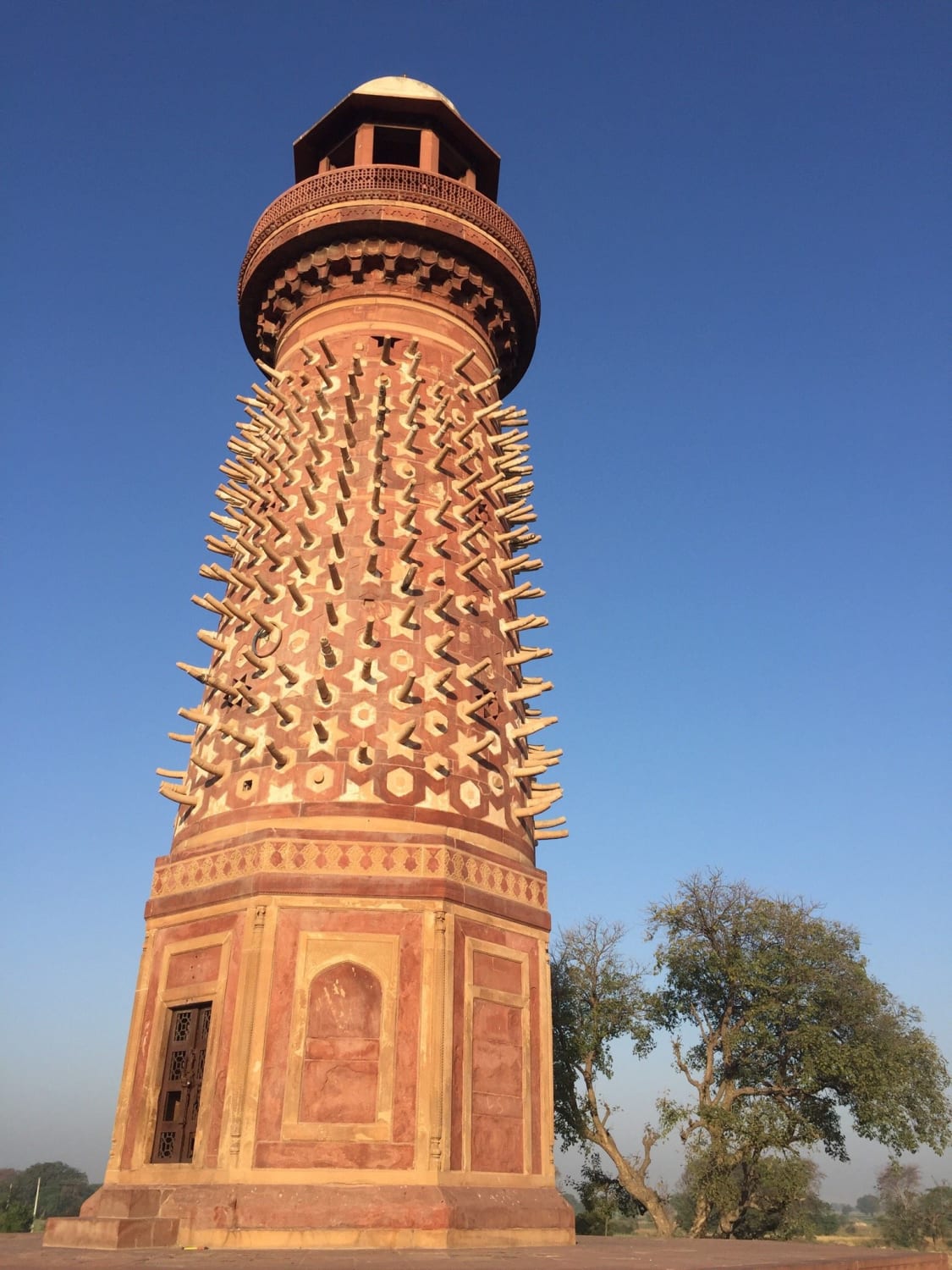 Hiran Minar or Ivory tower in Fatehpur Sikri near Agra in India. Traditionally it was thought to have been erected as a memorial to the Emperor Akbar's favourite elephant. However, it was probably a used as a starting point for subsequent mile posts.