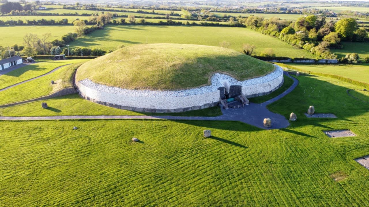 Newgrange is a prehistoric monument in County Meath, Ireland, about one kilometer north of the River Boyne. It was built about 3200 BC, during the Neolithic period, which makes it older than Stonehenge and the Egyptian pyramids.
