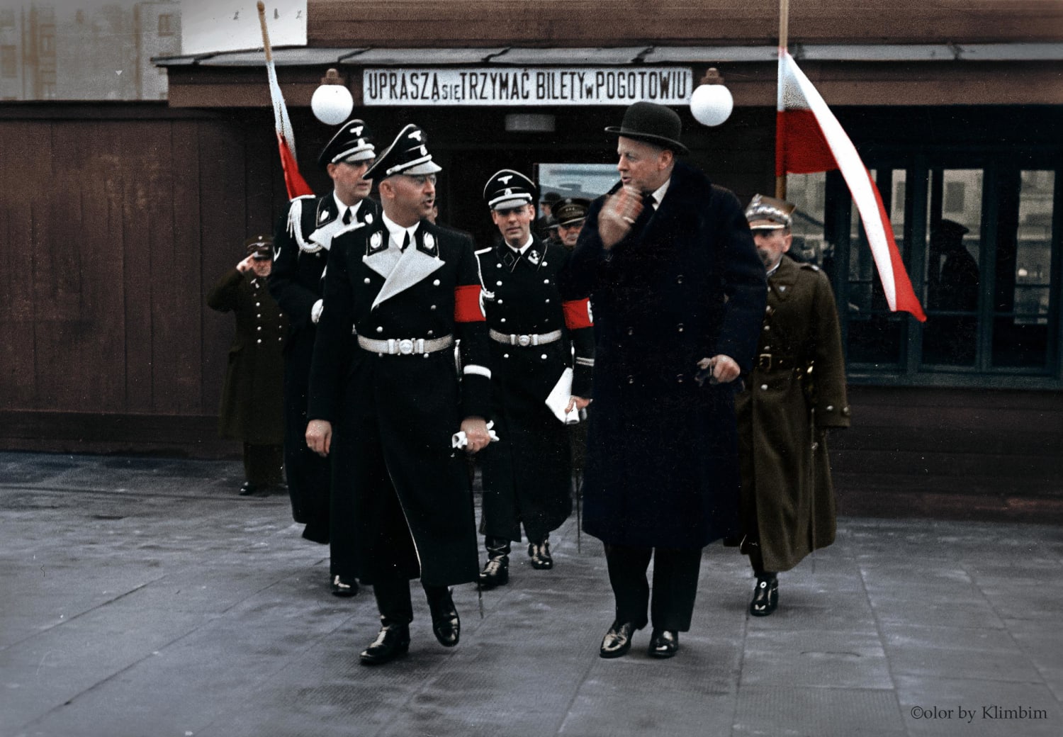 Months before the WW2 started: Feb 1939, Heinrich Himmler, the Reichsführer of the SS and Chief of the German Police, during his visit to Warsaw. He is accompanied by General Józef Zamorski, the Chief of the Polish State Police, and Hans von Moltke, the German Ambassador to Poland