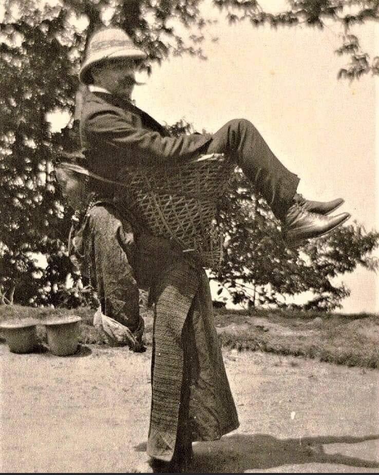 Pierre Rodier, a French colonial administrator, challenges local Burmese woman to carry him after being impressed by them carrying heavy goods. 1900.