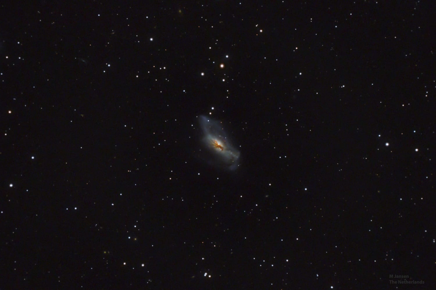 NGC 2146 galaxy after close encounter with another galaxy