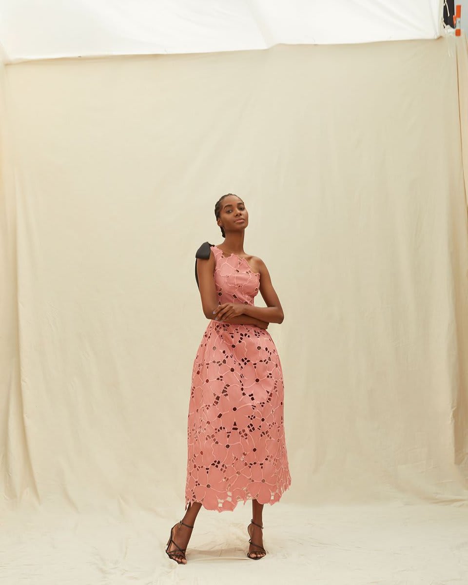 Pretty in pink. odlrprespring2021 is imbued with sartorial lightness. The eyelet lace dress, cut with a single shoulder and A-line silhouette, echos the buoyant spirit of the season.