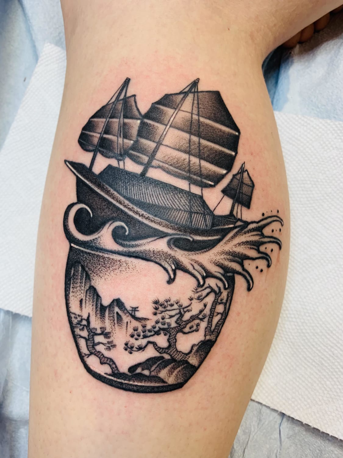 Ship in a tea cup tattoo designed by me, done by Harry Lau at Sovereign Tattoo, Portland Oregon