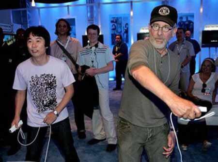 Shigeru Miyamoto and Steven Spielberg playing Wii Sports Tennis with each other (2006)