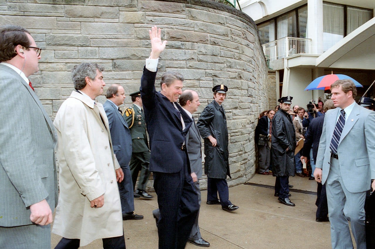 On This Day: Ronald Reagan Waves Moments Before He Is Shot by John Hinckley Junior, March 30, 1981