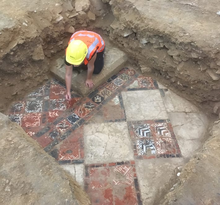 Brightly colored tiles were uncovered during excavations in advance of restoration at England’s Bath Abbey.