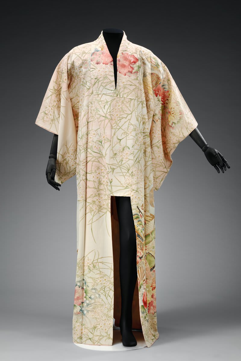 This delicately patterned kimono was owned by Freddie Mercury and worn by the musician at home. In contrast to his flamboyant on-stage style, for which he sometimes wore boldly patterned kimono, this garment is quite subdued.