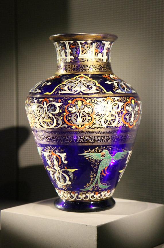 The "Cavour Vase" is a Mamluk cobalt-blue and purple enamelled and gilded glass vessel, made either in Syria or Egypt. Late 13th century CE, now on display at the Museum of Islamic Art in Doha, Qatar