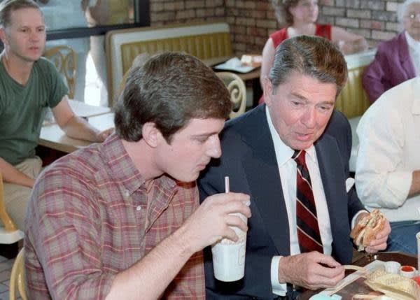 Ronald Reagan having lunch with University of Alabama student after a speech. (Oct. 15, 1984)