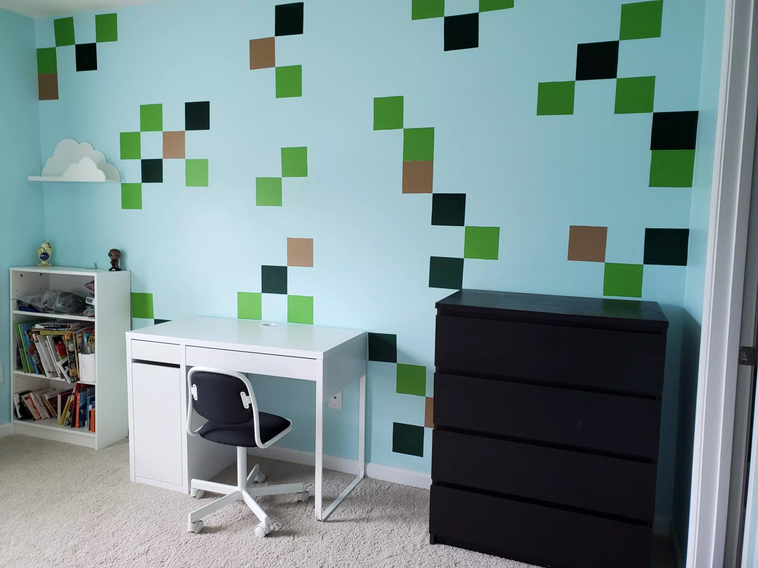 I made a Minecraft wall in my son's bedroom with wall-safe adhesive vinyl squares!
