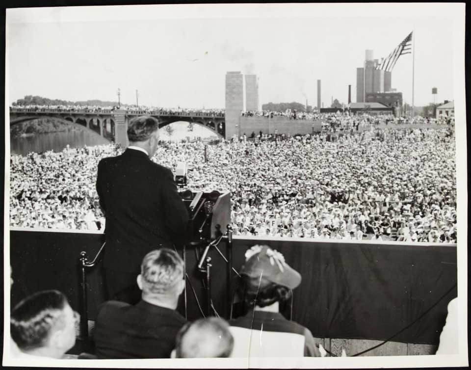 President Franklin Delano Roosevelt dedicates the George Rogers Clark Memorial in Vincennes, Indiana, on June 14, 1936. Handrails are clearly seen attached to the podium so that the polio-stricken president can support himself .
