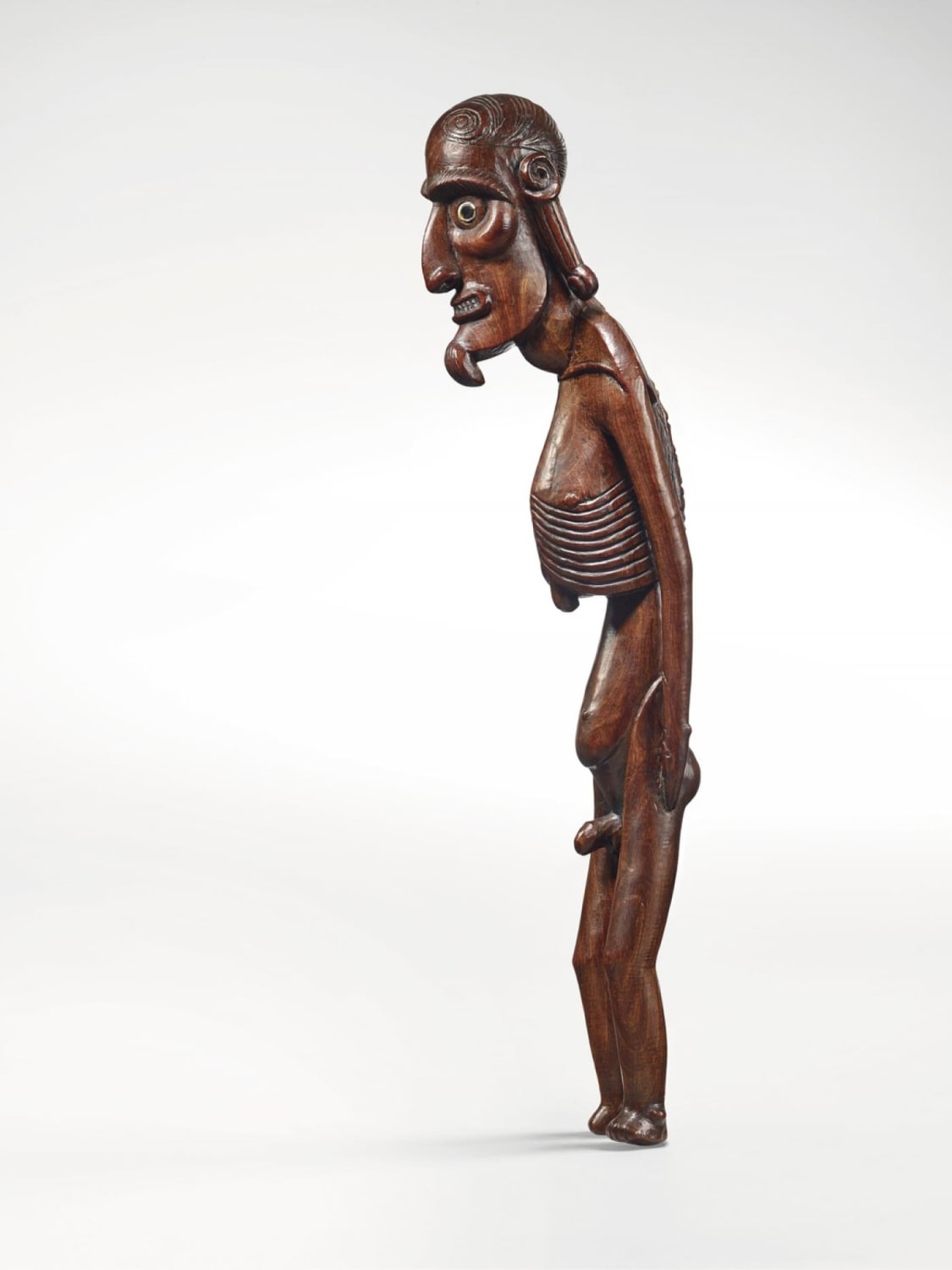 A mo‘ai kavakava figure from Easter Island, carved in toromiro (a species of an endemic flowering tree). Rapa Nui culture, late 18th century-early 19th century, sold at christie's in 2019