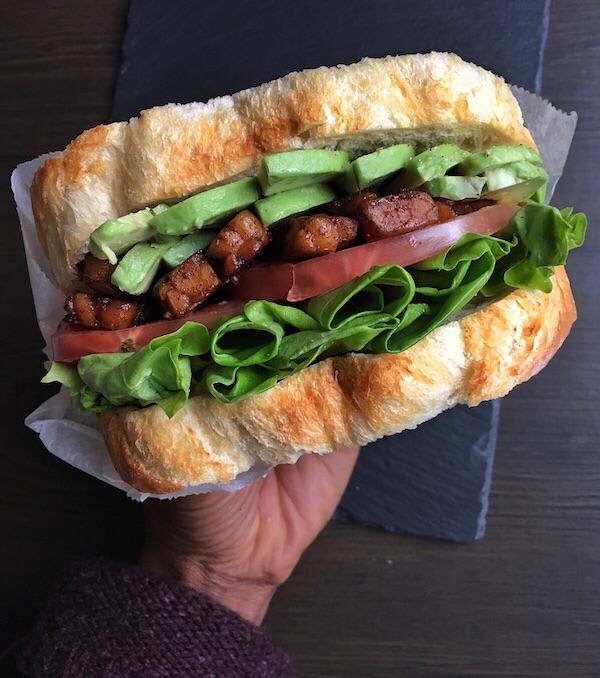 Vegan tempeh “bacon”, lettuce, tomato sandwich with avocado. Because....Yes.