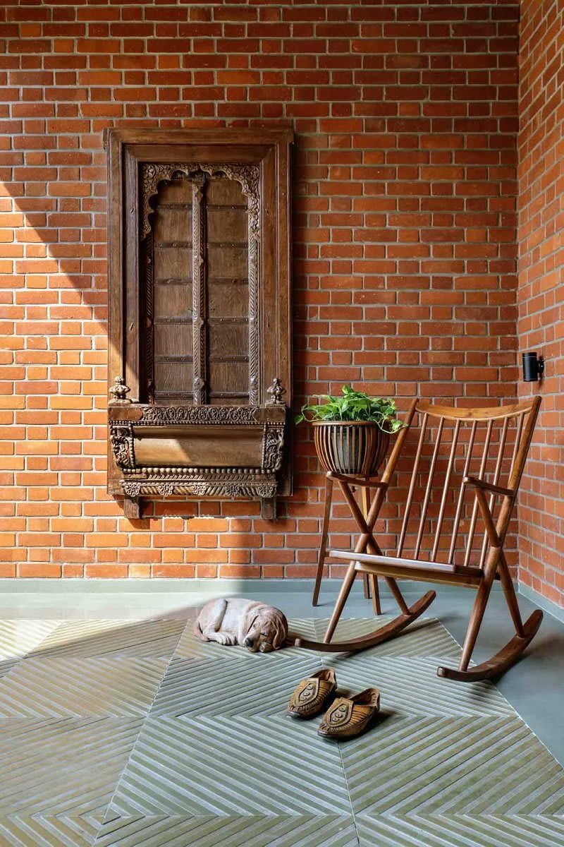 k.n. associates’ brick + rcc home infuses traditional indian heritage with contemporary design