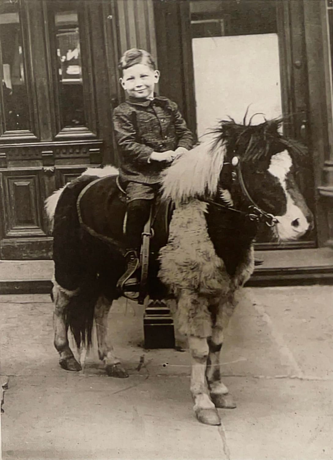 Posing for a picture on a pony, New York City, 1924