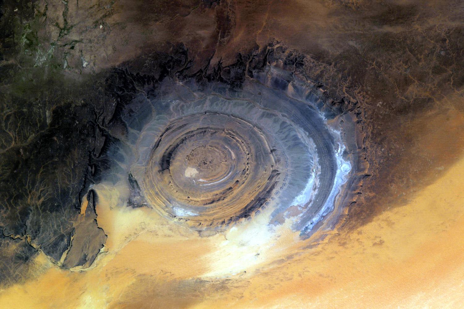 Although this unique object called The Eye of Sahara or Richat Structure has been explained as purely natural creation, its eerie looks and massive dimensions (40km/25mi in diameter) spawned a few "strange" theories. According to one, it's Atlantis.