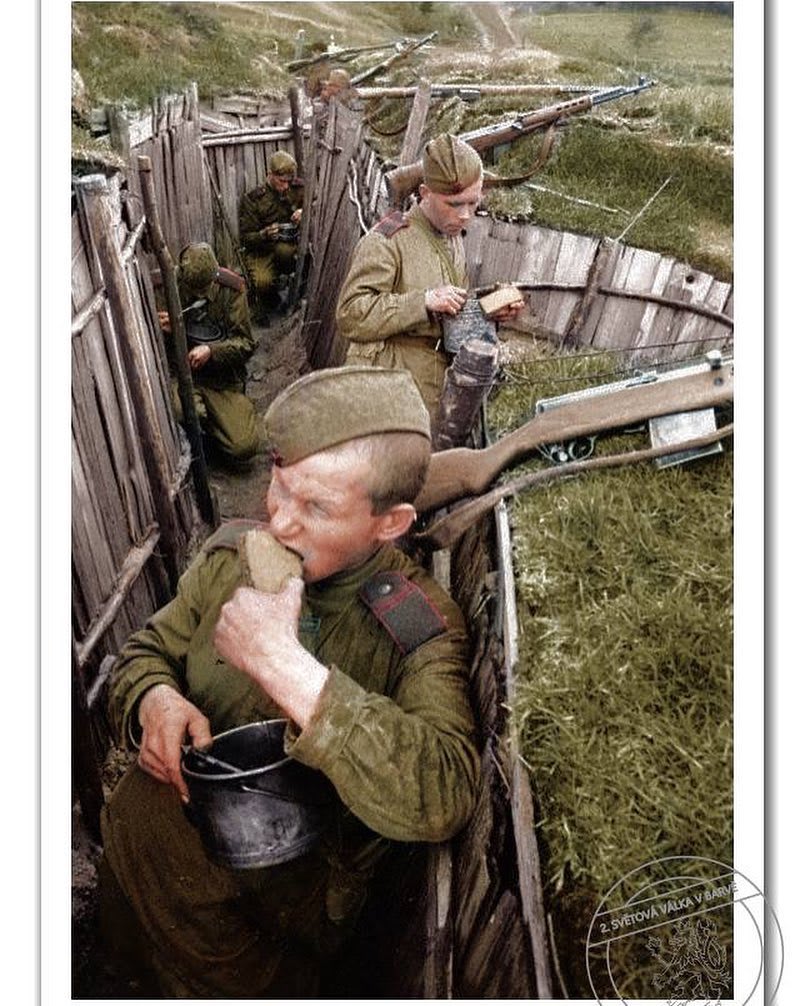 Colorized photo of Red Army soldiers armed with auto-loading rifles SVT-40 caliber 7.mm. Kalinin Front, Soviet Union, 1943.