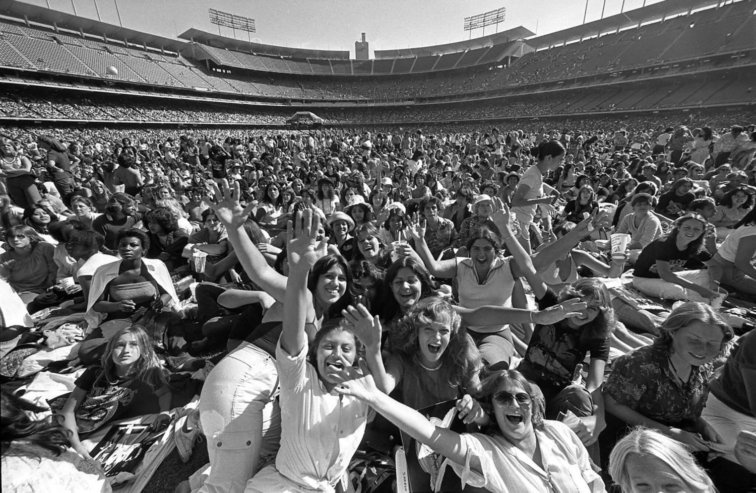 Crowd waiting for Bee Gees concert at Dodger Stadium, Los Angeles, CA (1979)