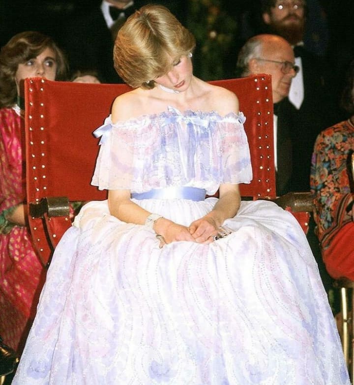 Princess Diana falling asleep during a royal engagement in 1981. At the time early along in her pregnancy with William.