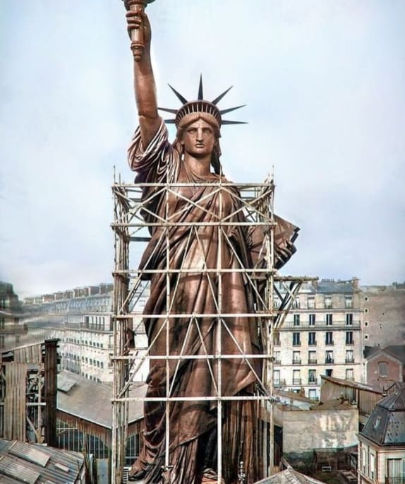 Colorized photo of the Statue of Liberty in Paris in the 1880s before it was transported to the US.