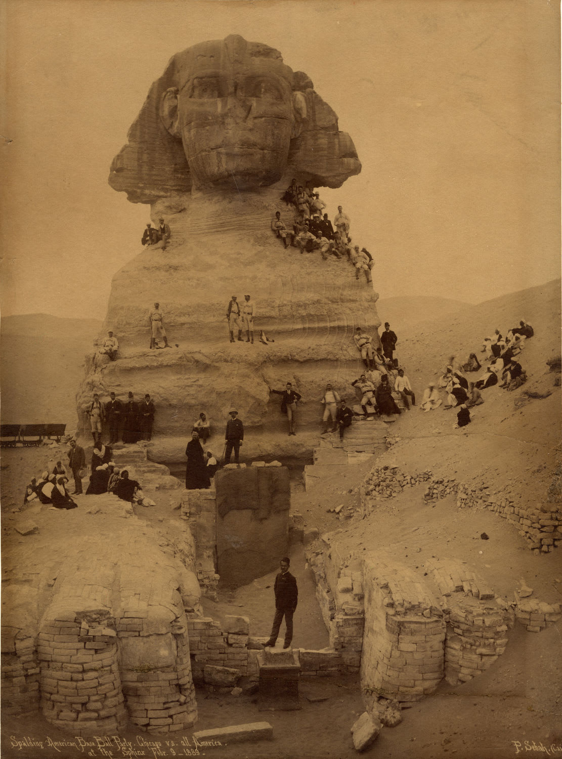 The members of the National League's around the world tour in 1888-89, pose on the Great Sphinx in Giza, Egypt, for a portrait in February of 1889.