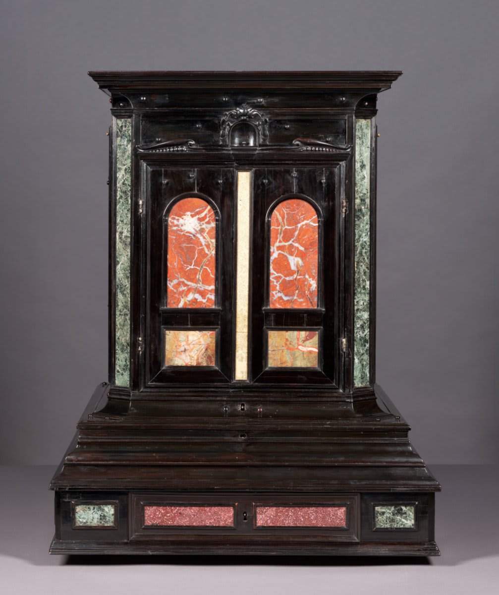 What says "look at how smart, fancy, and well-traveled I am" more than a well-curated cabinet of curiosities? (Well, probably a few things—but let's focus on how cool this cabinet is.)