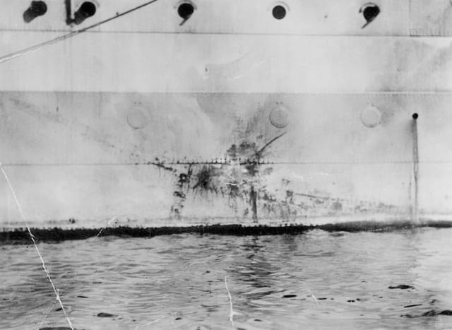 Imprint of a Japanese kamikaze aircraft on the side of the HMS Sussex. 1945