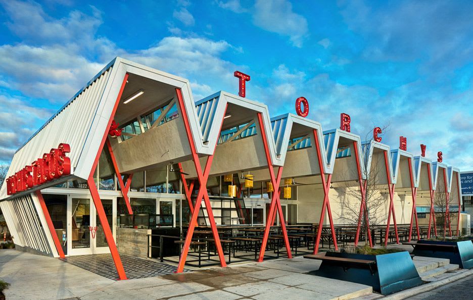 Torchy's Tacos restaurant by Chioco Design references roadside architecture