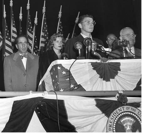 Ronald Reagan campaigning for the re-election of President Harry S Truman. President Truman and Actress Lauren Bacall can be seen alongside Reagan, 1948