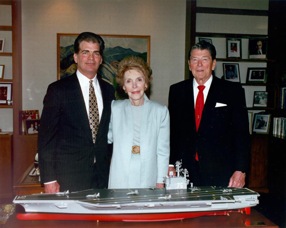 Newport News Shipbuilding CEO William Fricks presents Ronald and Nancy Reagan a model of the 9th and penultimate Nimitz Class carrier USS Ronald Reagan, May 1996... The USS Ronald Reagan would be commissioned in 2003
