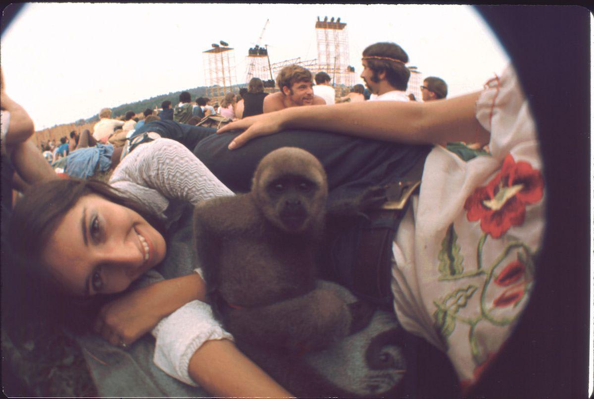 Girl at Woodstock 1969 with her monkey