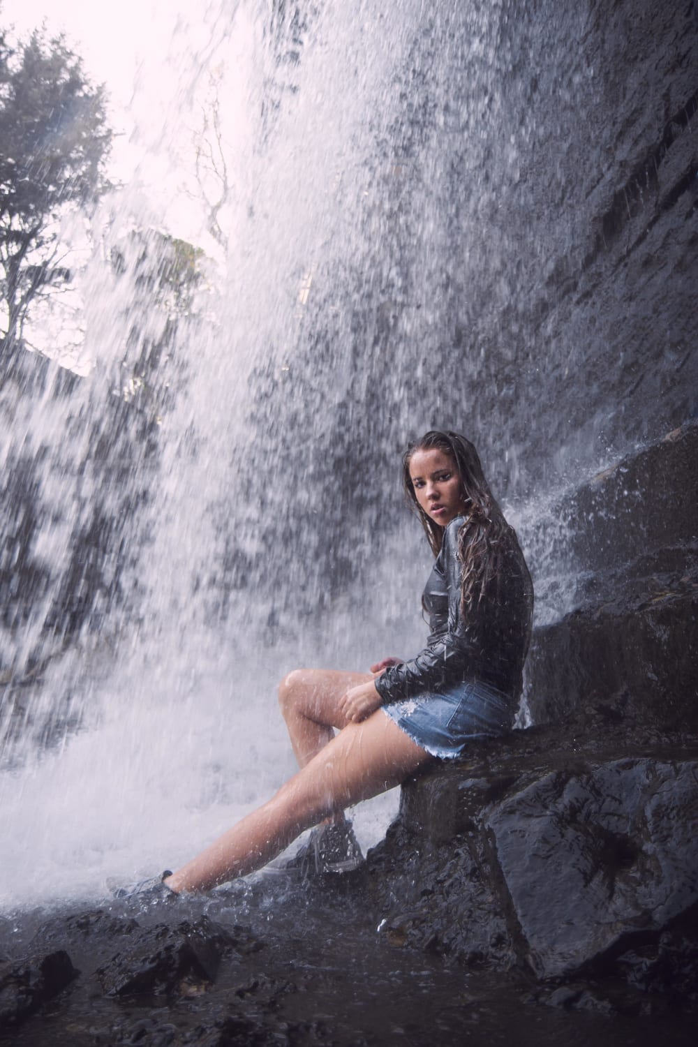 I found this photo deep in my old hard drive- a photo of my friend in high school at a waterfall in Dallas, Tx.
