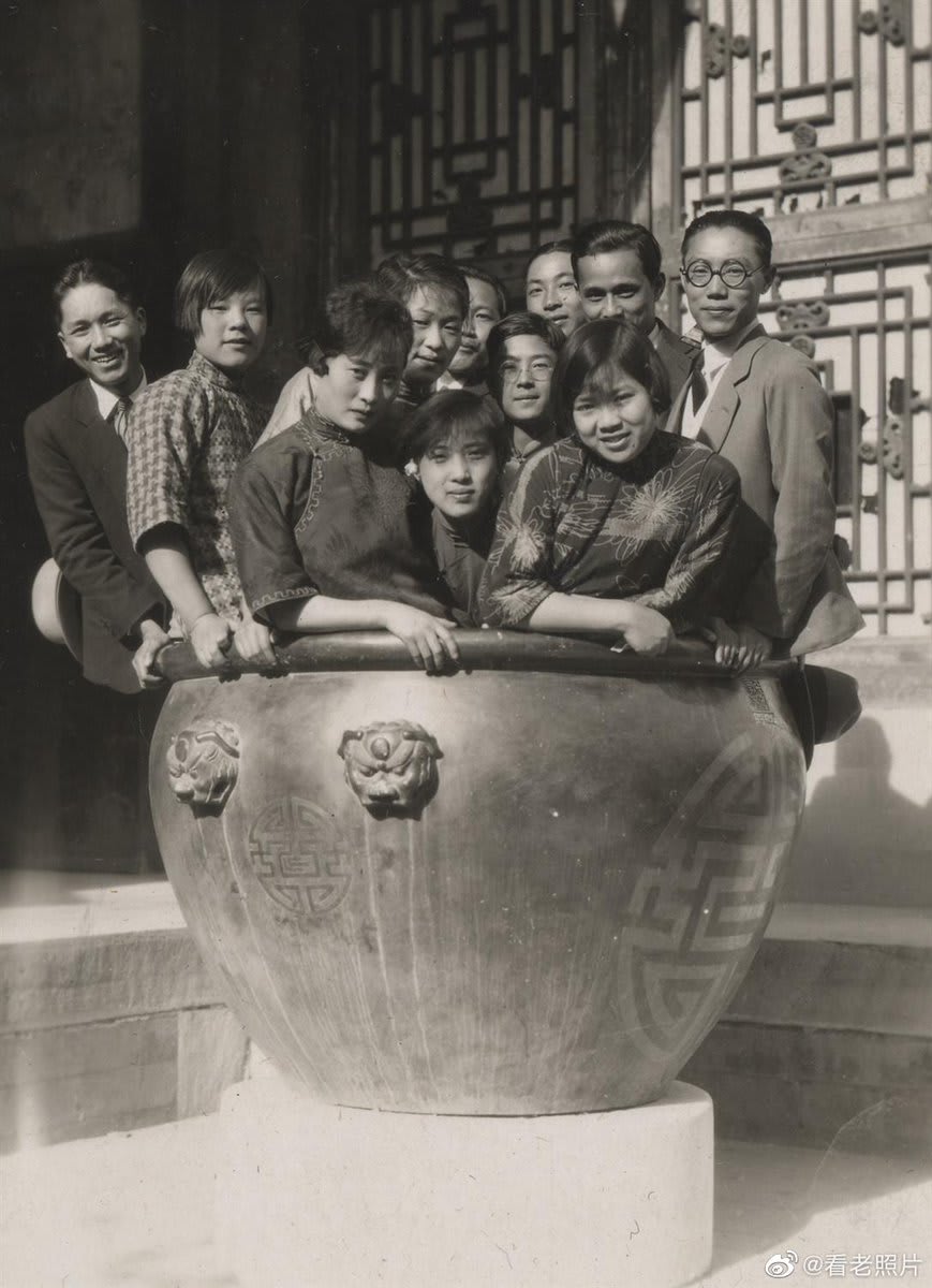 University students crammed into a large jar at the Summer Palace in Beijing, 1946