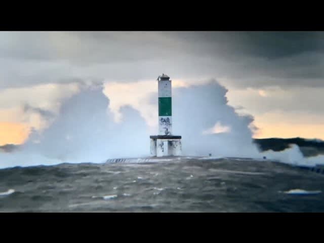 Violent Lake Michigan waves crashing over pier – Holland MI￼