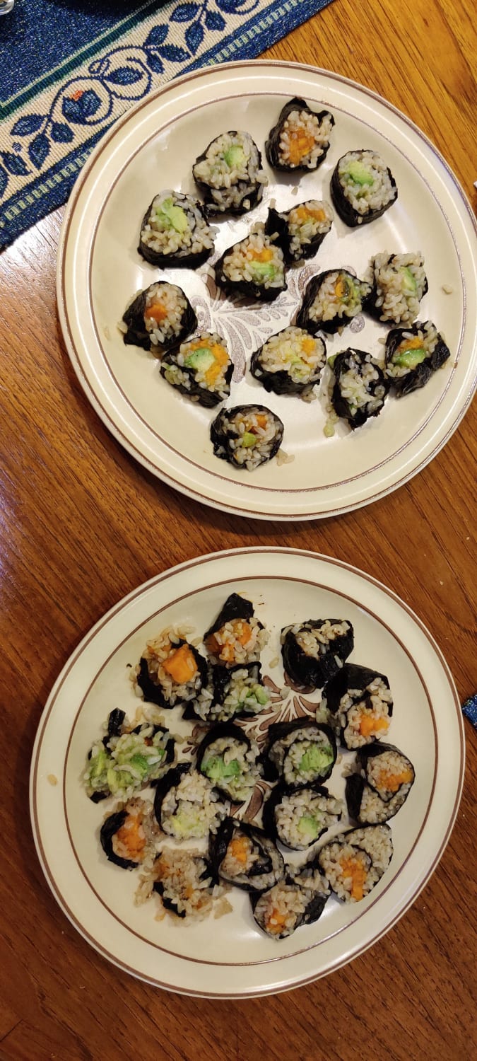 My first attempt at sushi. You can tell I got a little better at slicing the rolls between the first and second plates. Centers are avocado and sweet potato.
