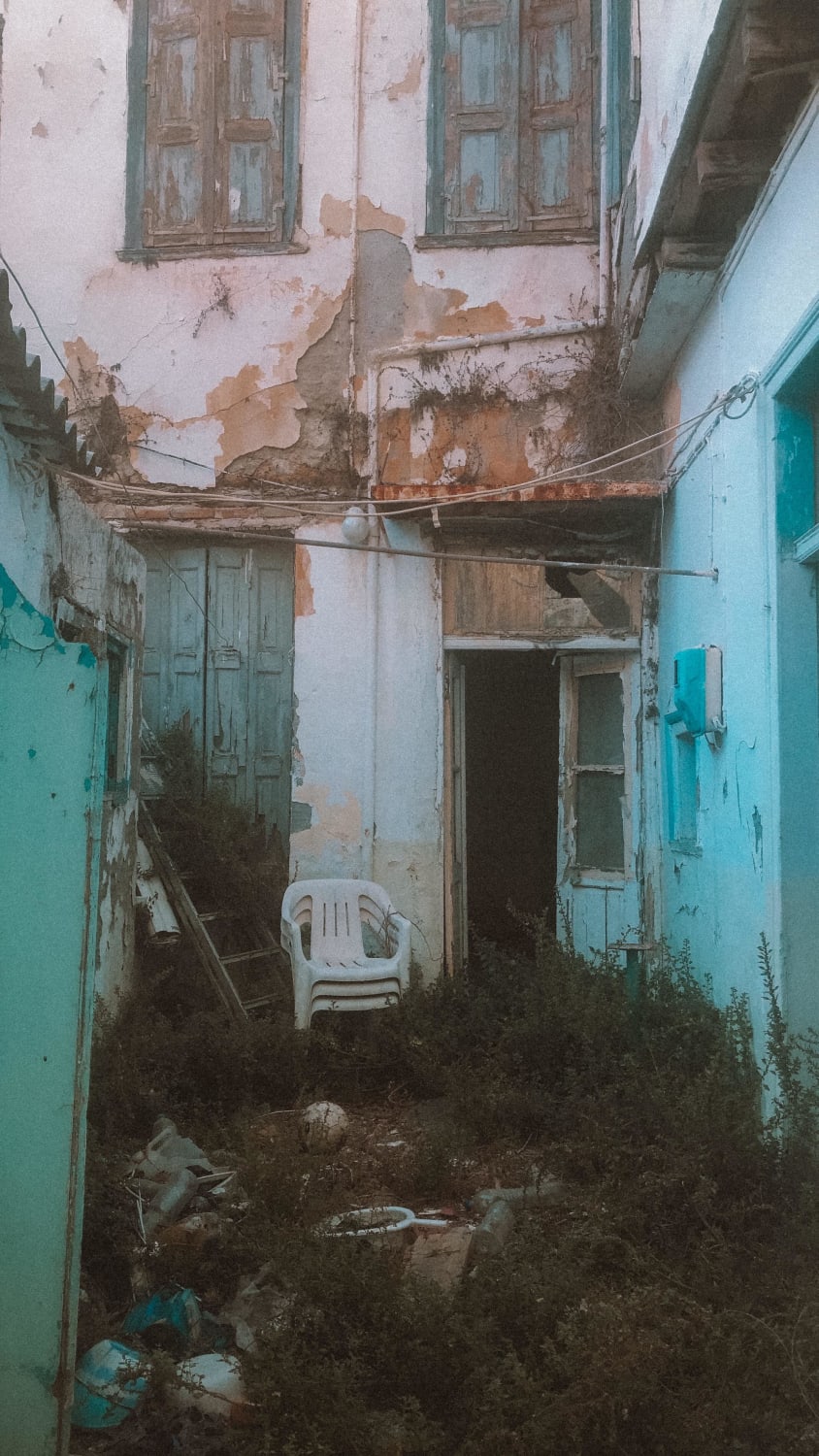 courtyard of an abandoned apartment in Iraklion Crete (might have to click to see the full image)