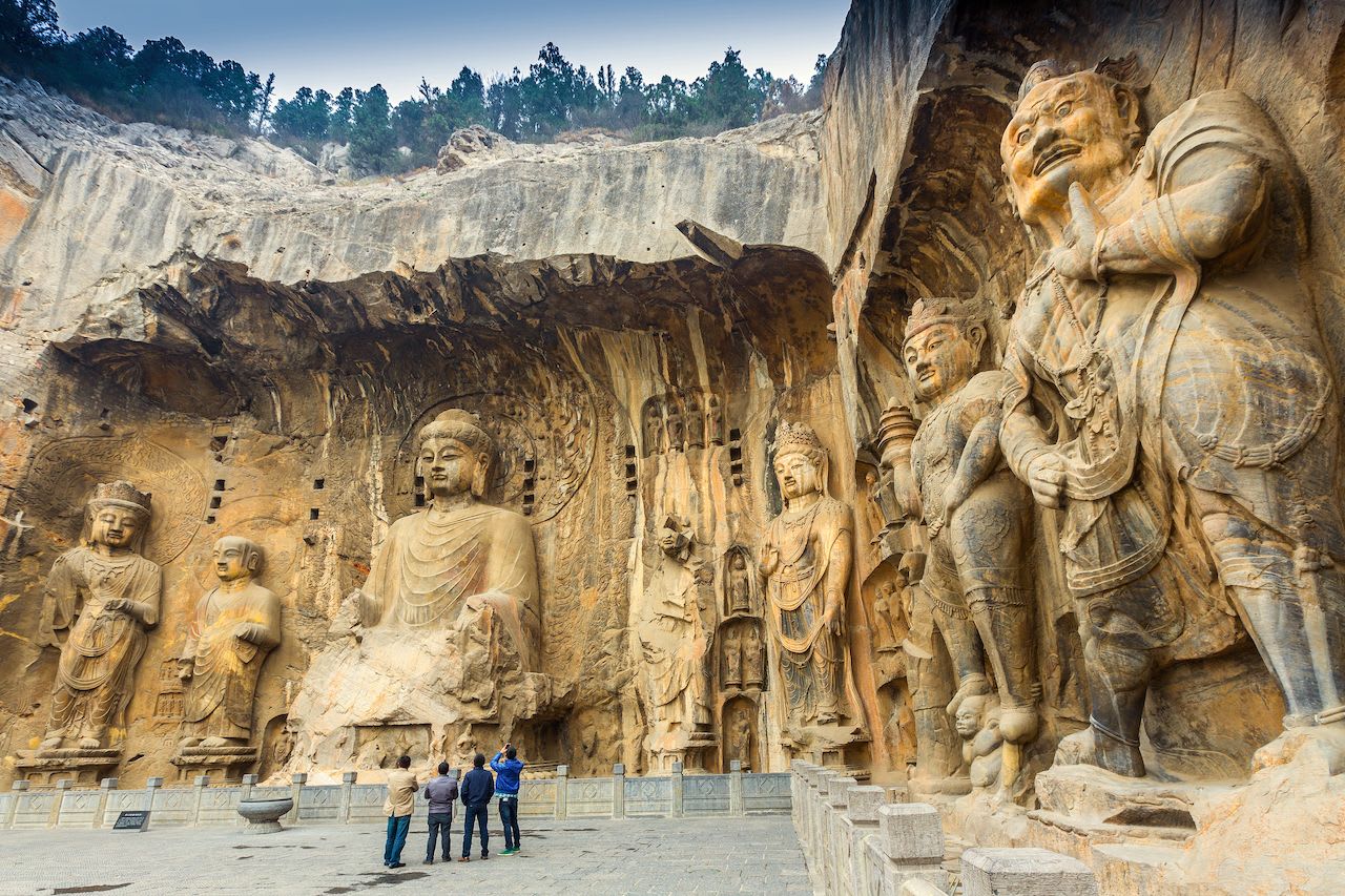 The Fengxian cave, built during the Tang dynasty between 672 and 676 for Empress Wu Zetian, is one of the largest caves of the Longmen Grottoes, a UNESCO world heritage site in China housing as many as 100000 statues within 2345 caves, ranging from 25 mm to 17 m in height