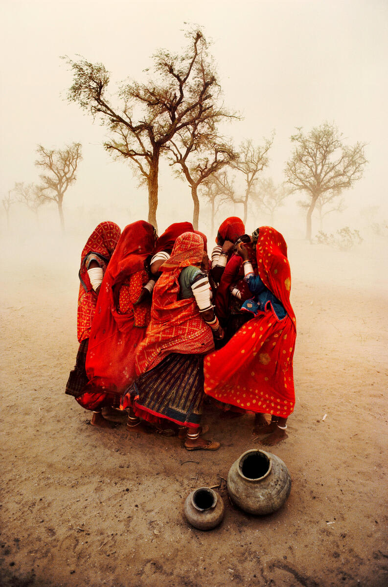 Steve McCurry took this image of women in a dust storm in Rajasthan, India, in 1983. The contact sheet which produced this image is available as a print now, as part of Magnum's 2020 Holiday Gift Guide: https://t.co/tree6HcXD7 © Steve McCurry / Magnum Photos