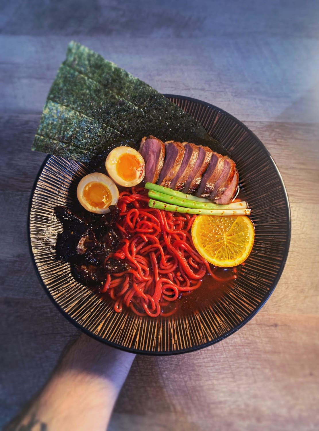 This was an experimental ramen I made with beetroot and wasabi noodles in a shio broth, pan roasted duck and black garlic shiitake. So good!