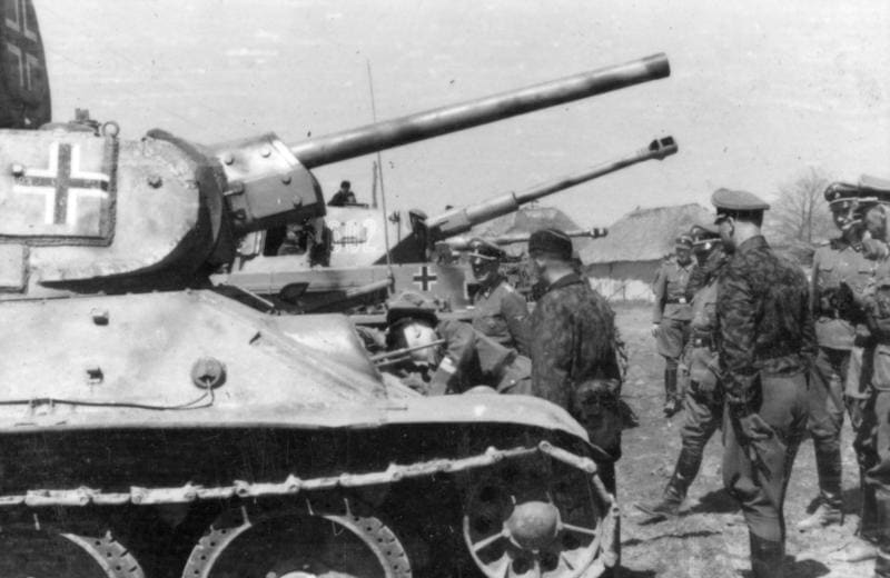 Heinrich Himmler examines a captured T-34/76 tank during his inspection of SS-Division Das Reich, Soviet Union, April 1943