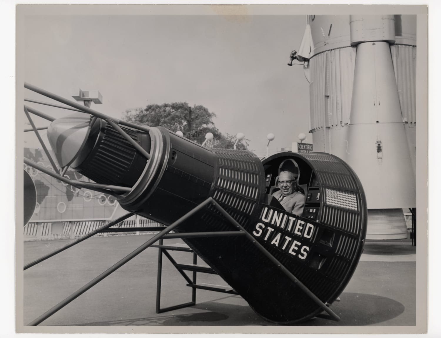 My great grandfather sitting in the Gemini spacecraft capsule at the 1964 World's Fair in Queens, NY. Visiting from Hannover, Germany.
