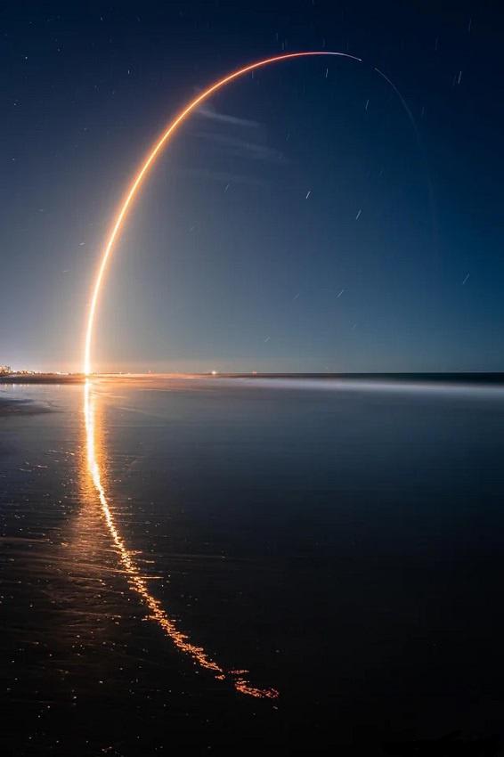Long Exposure Photograph of the Space-X launch, I love the reflection in the water and different shades of blue.